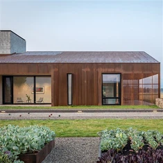 Dearadh Cumhdach Balla Cruach Corten